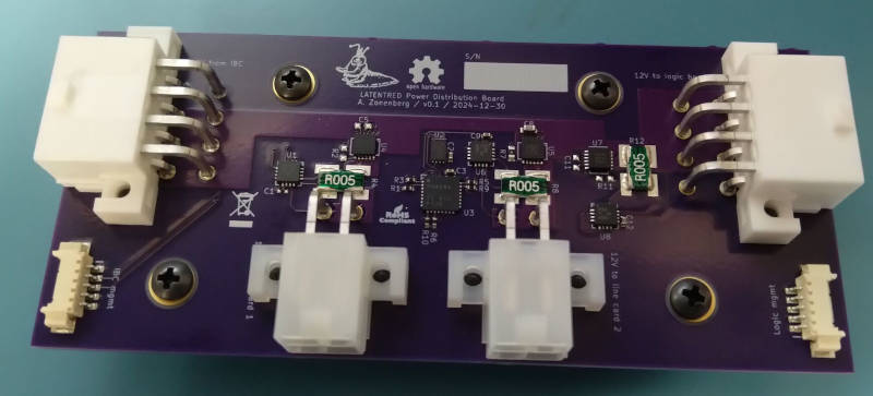 Purple PCB with four Molex Mini-Fit Jr power connectors and some passives